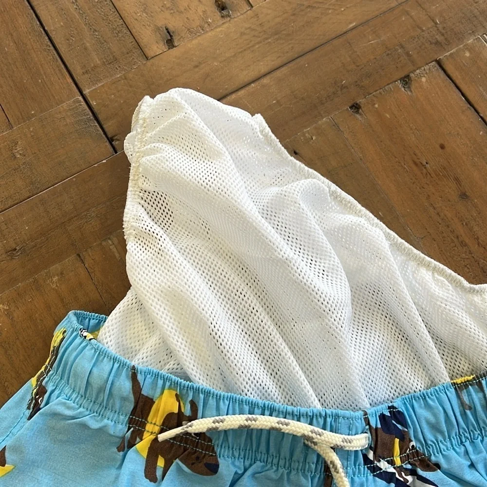 Mini Boden surfing dog swim trunks